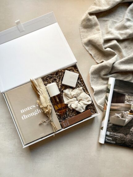 Luxury relaxation gift box for her – The Essence of Calm with a journal, fragrance, lip care, scrunchy, and dried flowers.