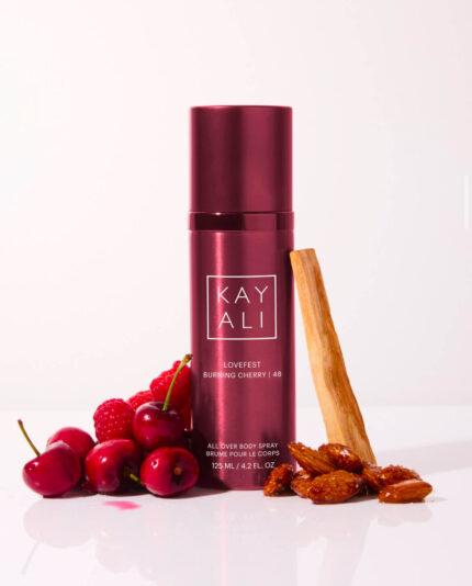 Kayali Body Spray in Lovefest Burning Cherry, a rich cherry and praline-scented mist with warm woody notes