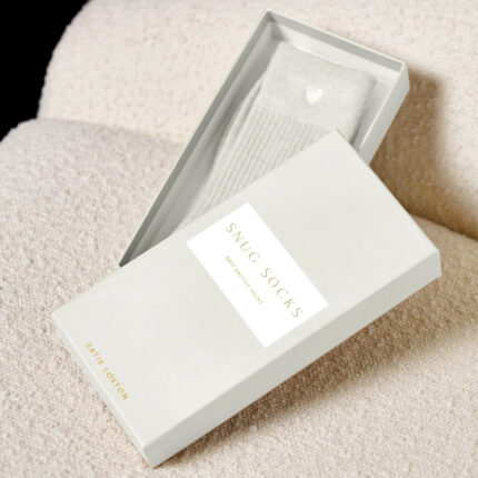 Katie Loxton snug socks in off white with ribbon wrap