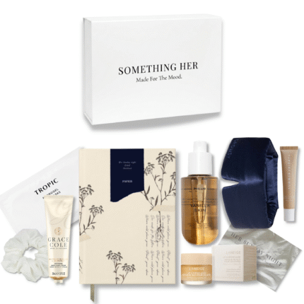 Sunday self-care box featuring a luxury sleep mask, notebook, body mist, lip balm, hand cream, silk scrunchie and more in a white gift box