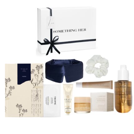 Sunday self-care box featuring a luxury sleep mask, notebook, body mist, lip balm, hand cream, silk scrunchie and more in a white gift box