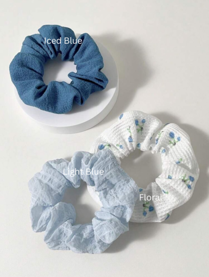 Textured iced blue scrunchy with soft ribbed fabric and gathered design