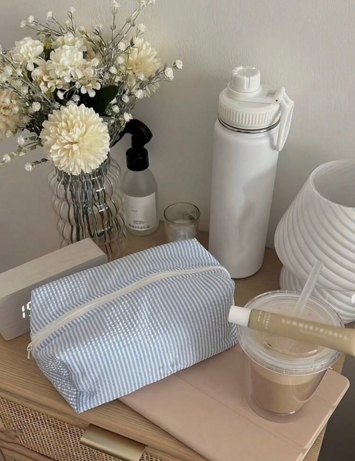 Screenshot Quilted striped cotton cosmetic bag for makeup, skincare and travel essentials