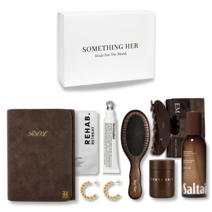 Saddle & Stone neutral lifestyle gift box with beauty products, jewellery, planner, purse, and everyday essentials in earthy brown tones.